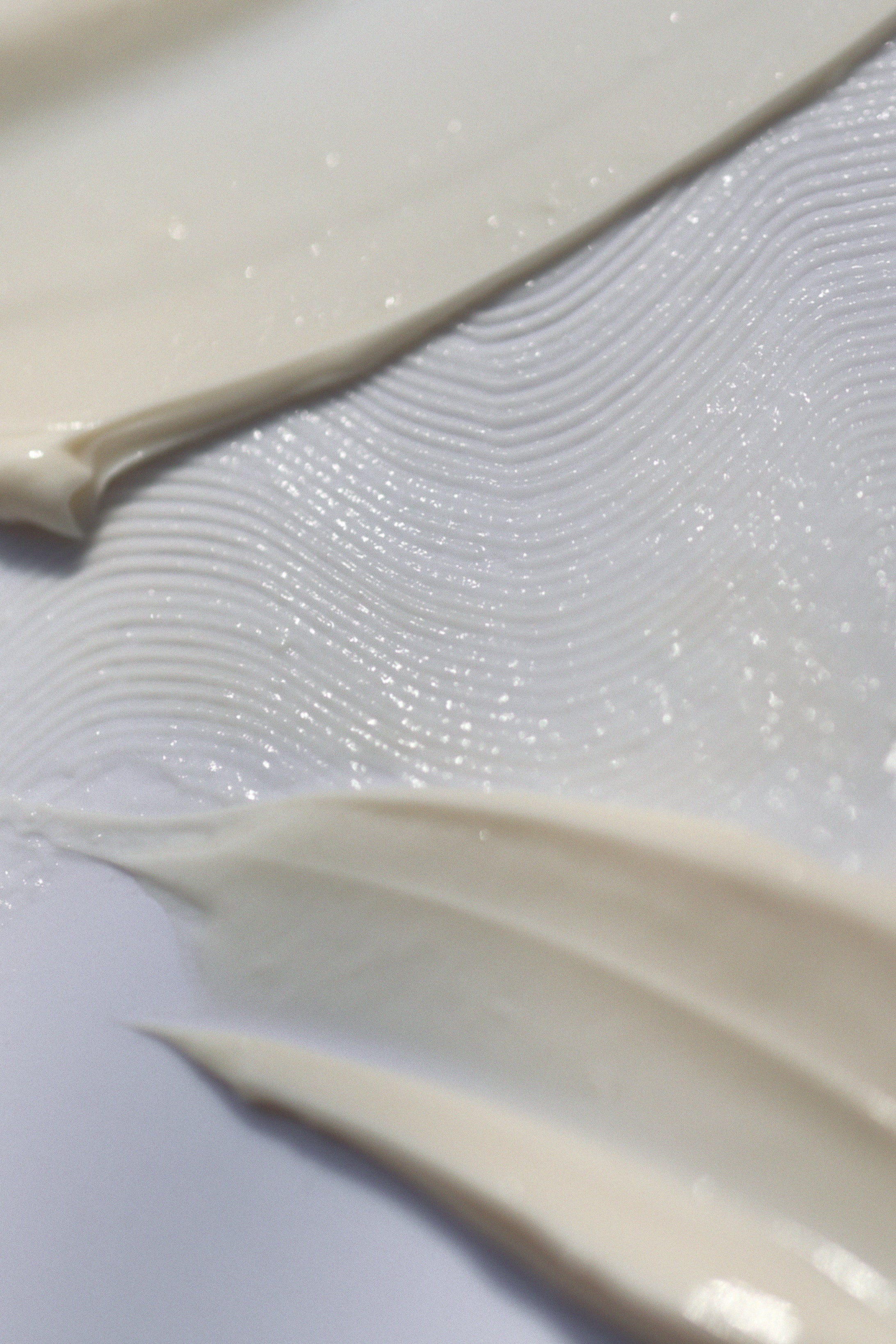 Product smeared on a flat surface, as we explore the differences between retinol vs retinoid