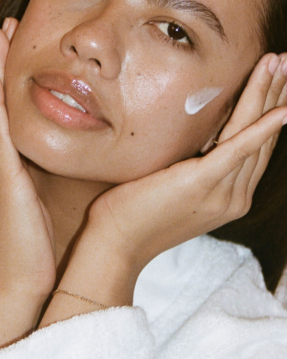 young woman applying the Secret Skincare product in the correct order